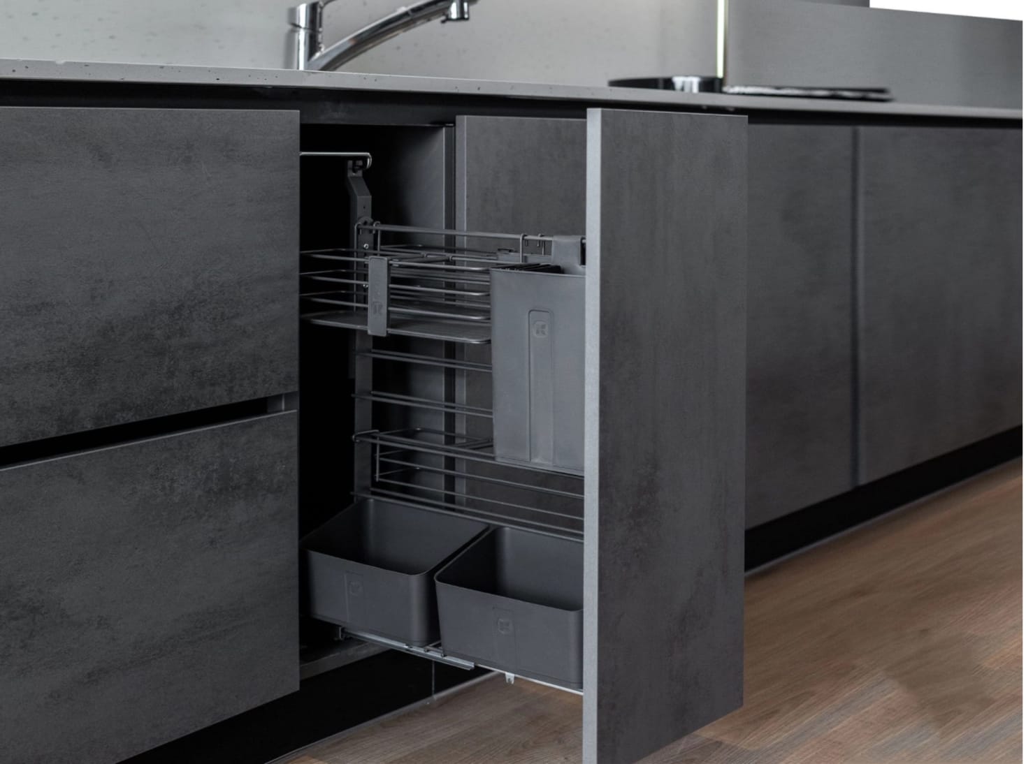 Luxury kitchen accessory hardware and organizational inserts in brushed steel and solid wood