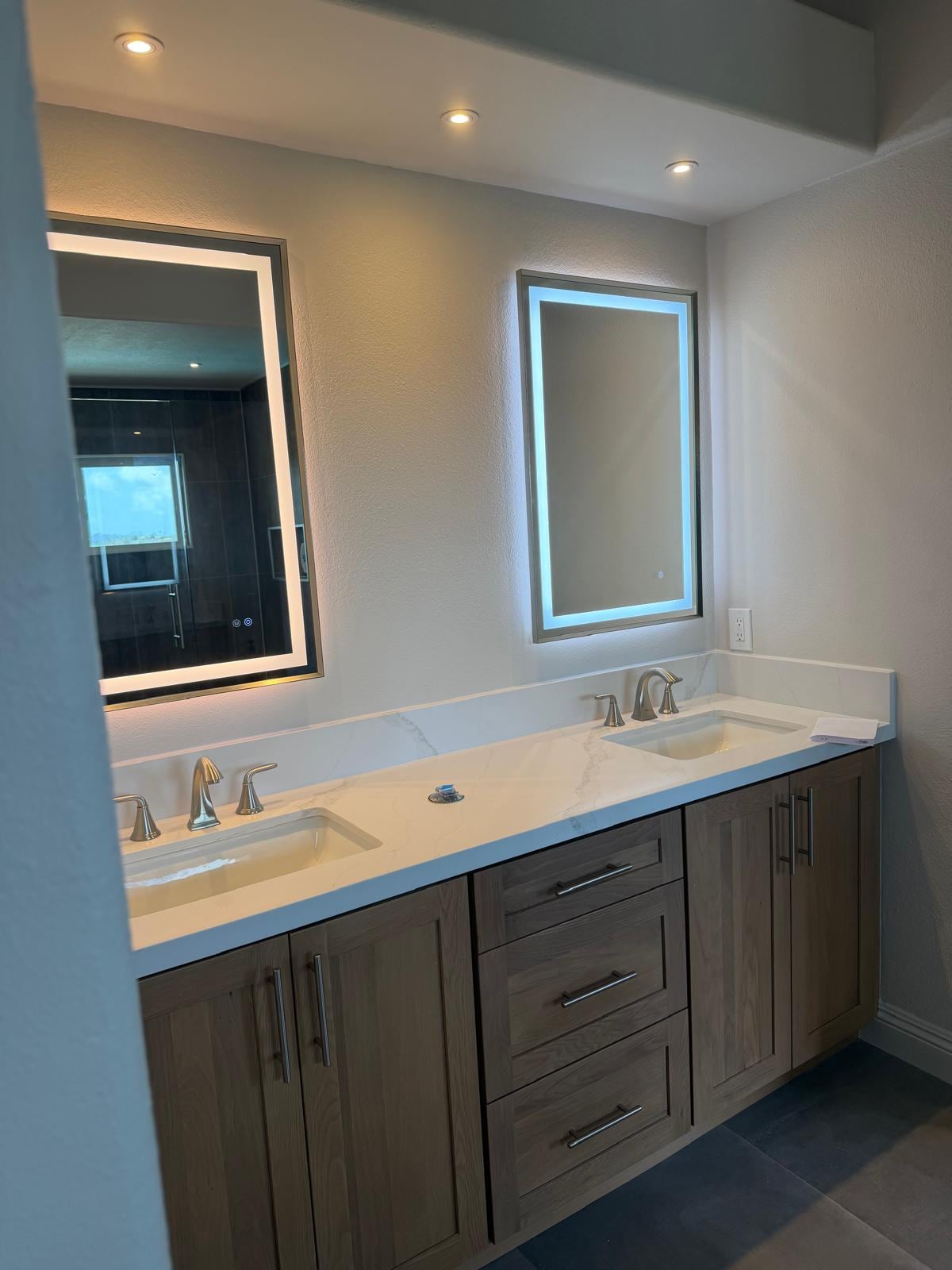 Backlit double vanity after remodel in Mission Viejo